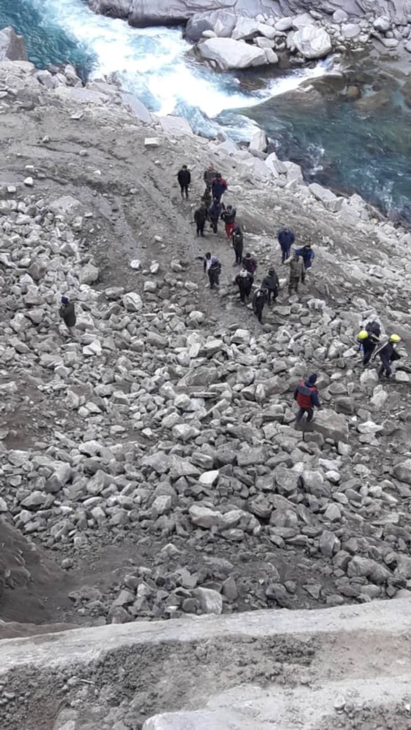 Highway Road Accident News: truck fell into alaknanda river, two missing, ground zero photos