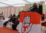 पूरनपुर में सम्मेलन को संबोधित करते कांग्रेस के प्रदेश अध्यक्ष लल्लू।