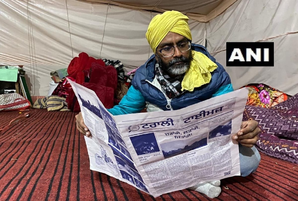 A group of volunteers launches ‘Trolley Times’ newsletter at Singhu border