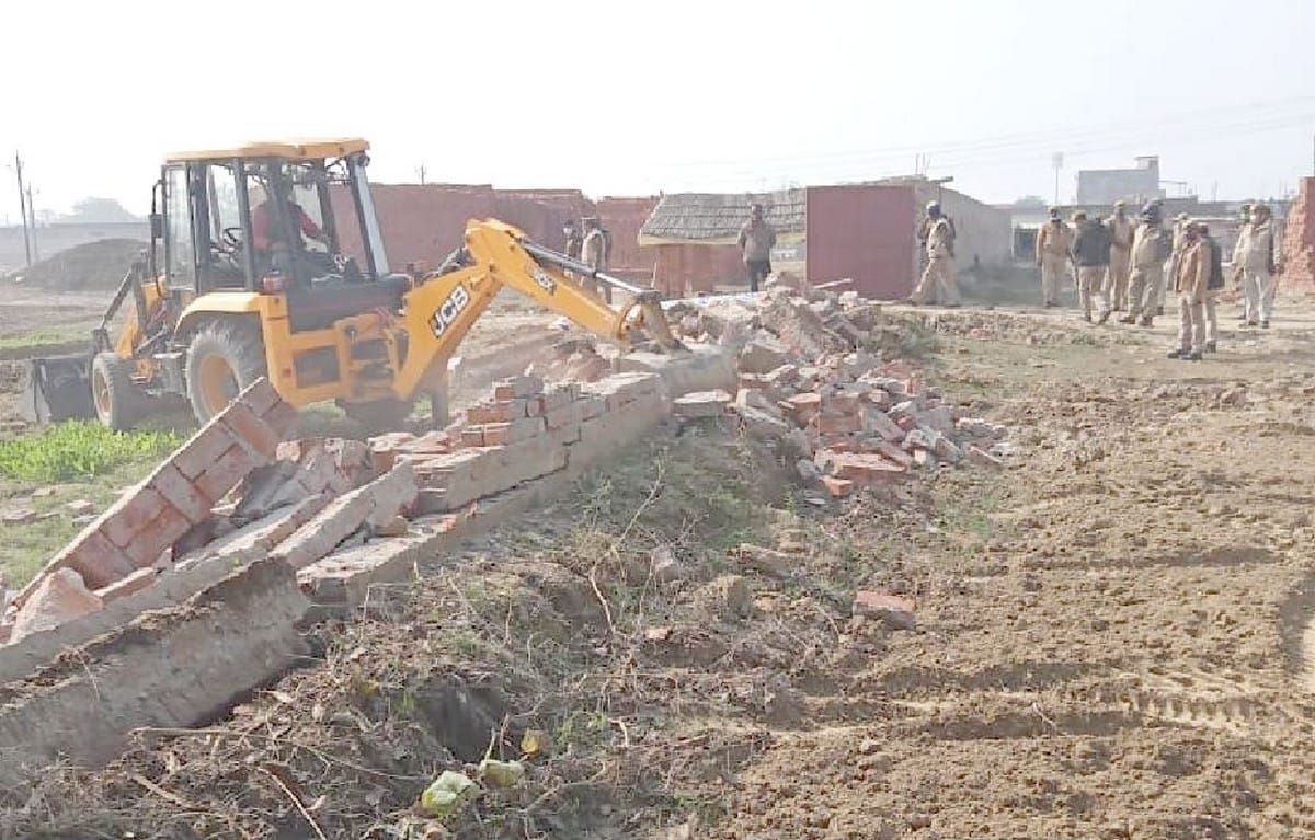 Bahubali MLA Vijay Mishra illegal construction removed by bulldozer from government land in bhadohi