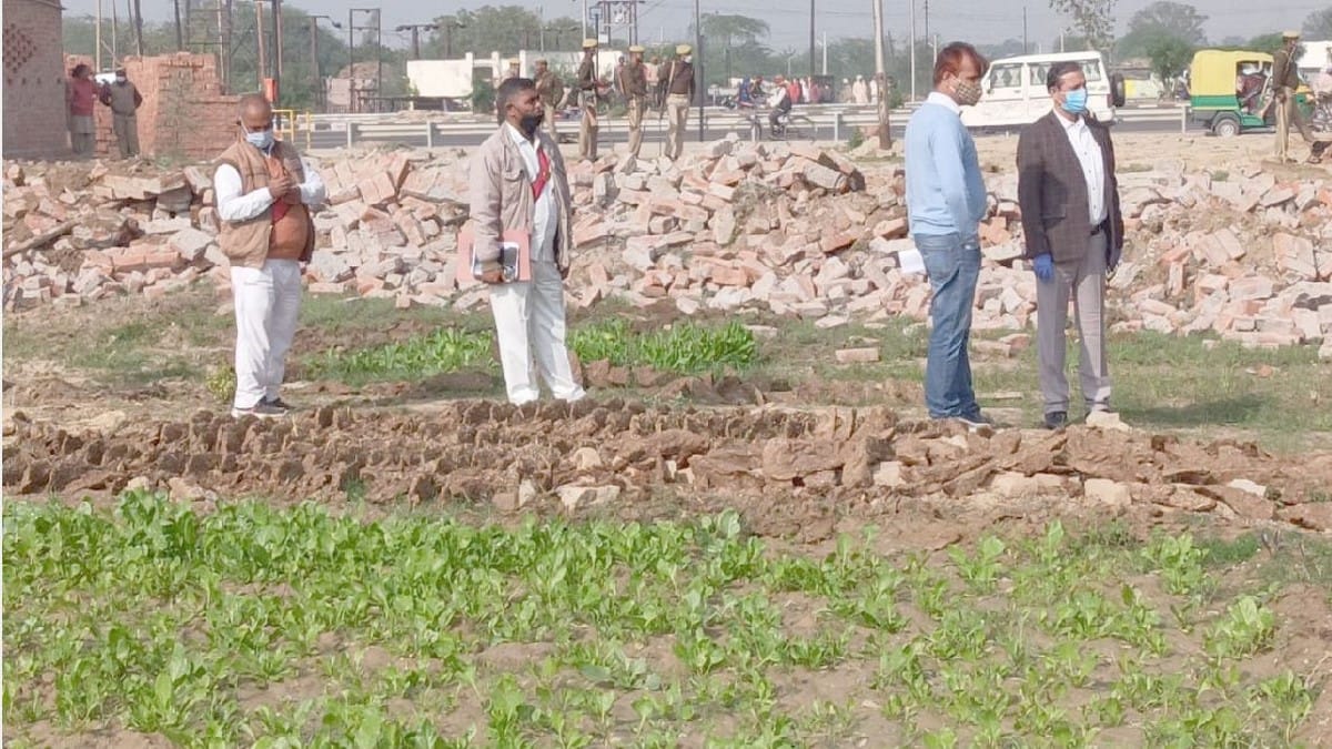 Bahubali MLA Vijay Mishra illegal construction removed by bulldozer from government land in bhadohi