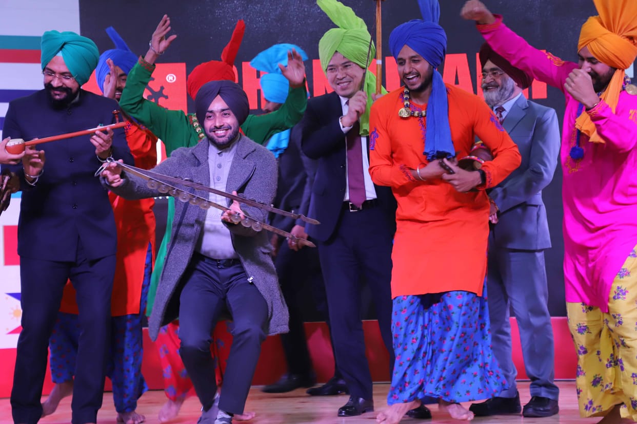 youth  participate in bhangra and gidha with Sartaj