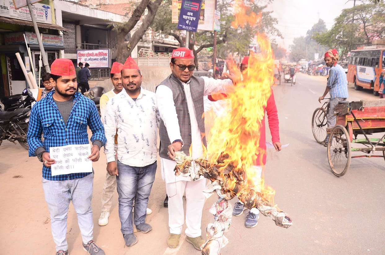 SP activists protest against acid attack on girl student