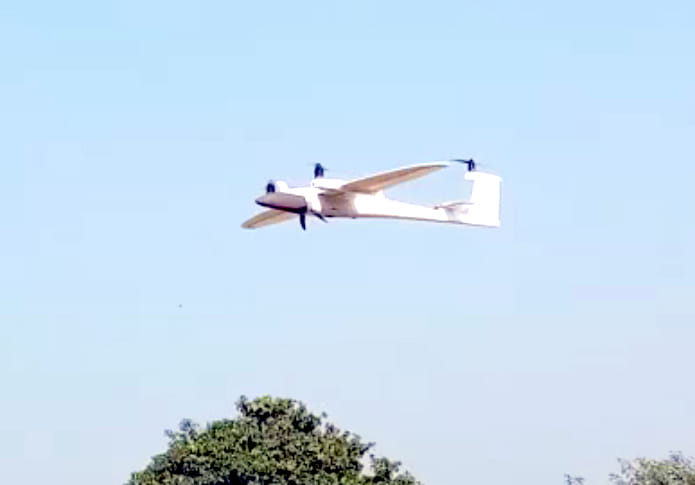 Drone flying from village to village for survey