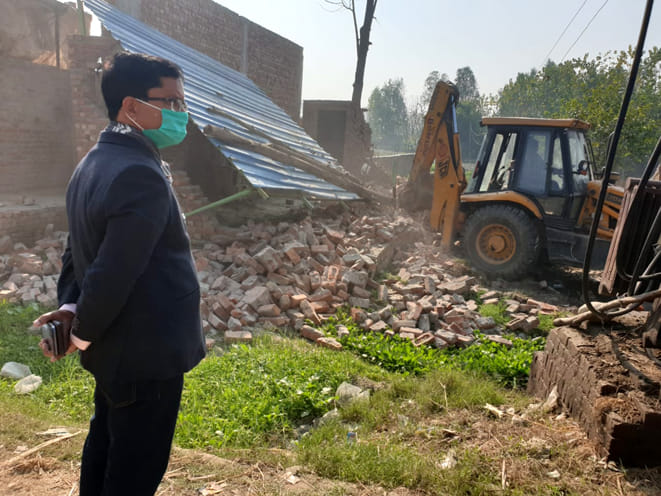 Illegal construction on nine acres of pond land collapsed