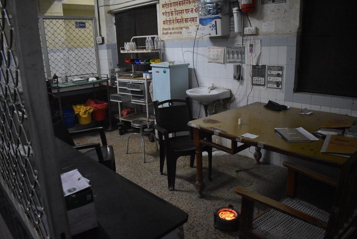 The chairs were empty in the nurses duty room, the heater was burning unnecessarily