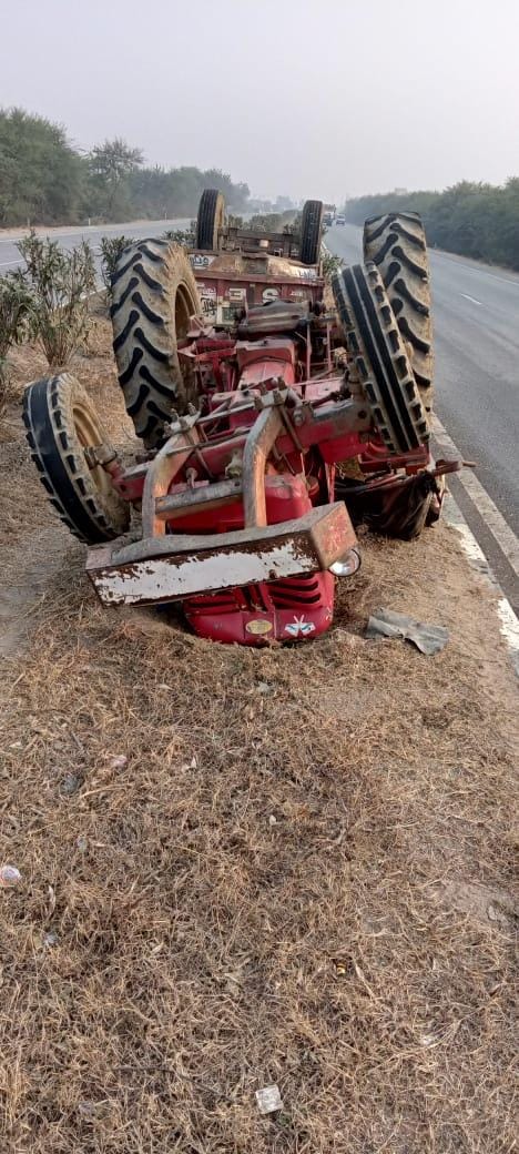 Roadways bus collision overturns tractor, two injured