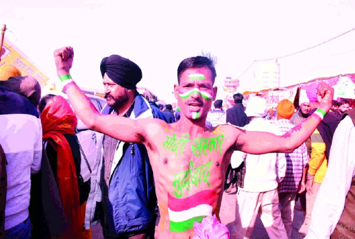 Farmer painted tricolor on body slogans written on arms and face