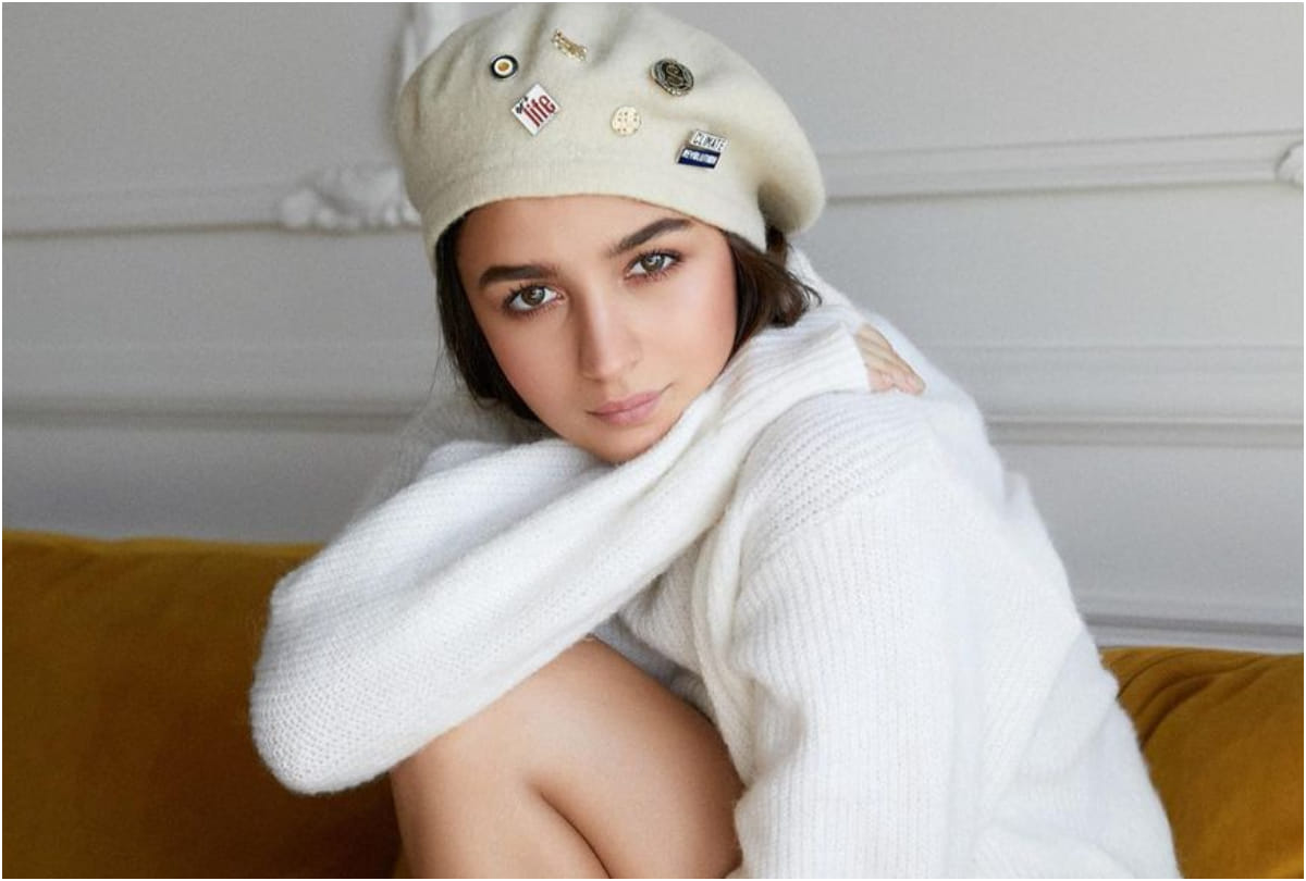 alia bhatt look sultry in winter look wearing white pullover with denim shorts