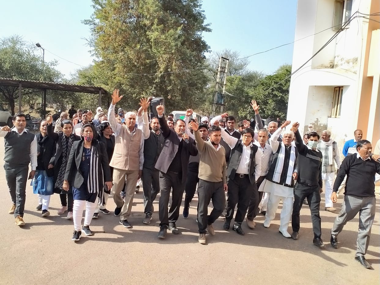 ADC's room besieged to hear complaints, lawyers sitting on dharna raising slogans