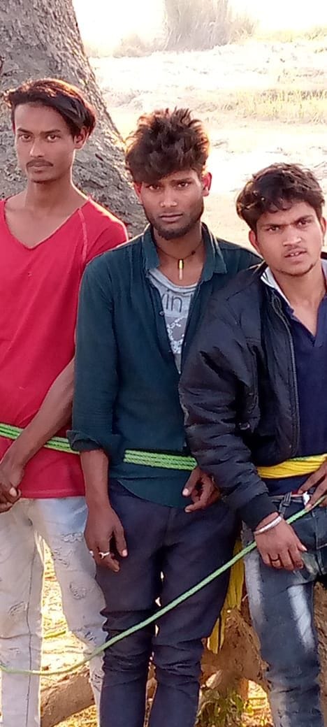 Villagers nabbed three miscreants and tied them to tree