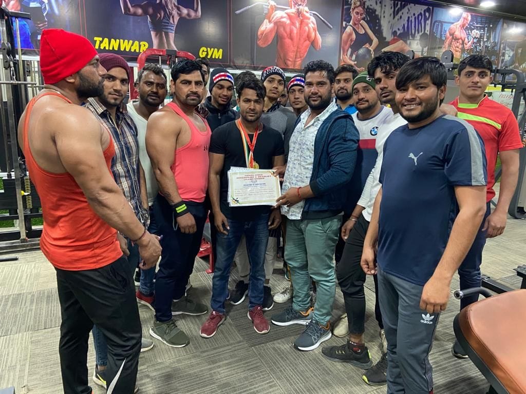 aadil secured first position in north indi a weight lifting