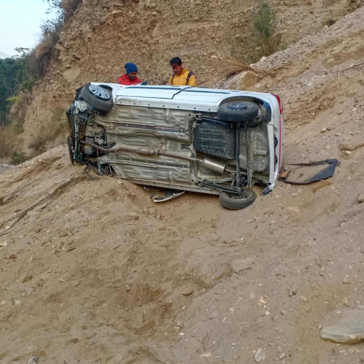 Car collided with hill, two injured