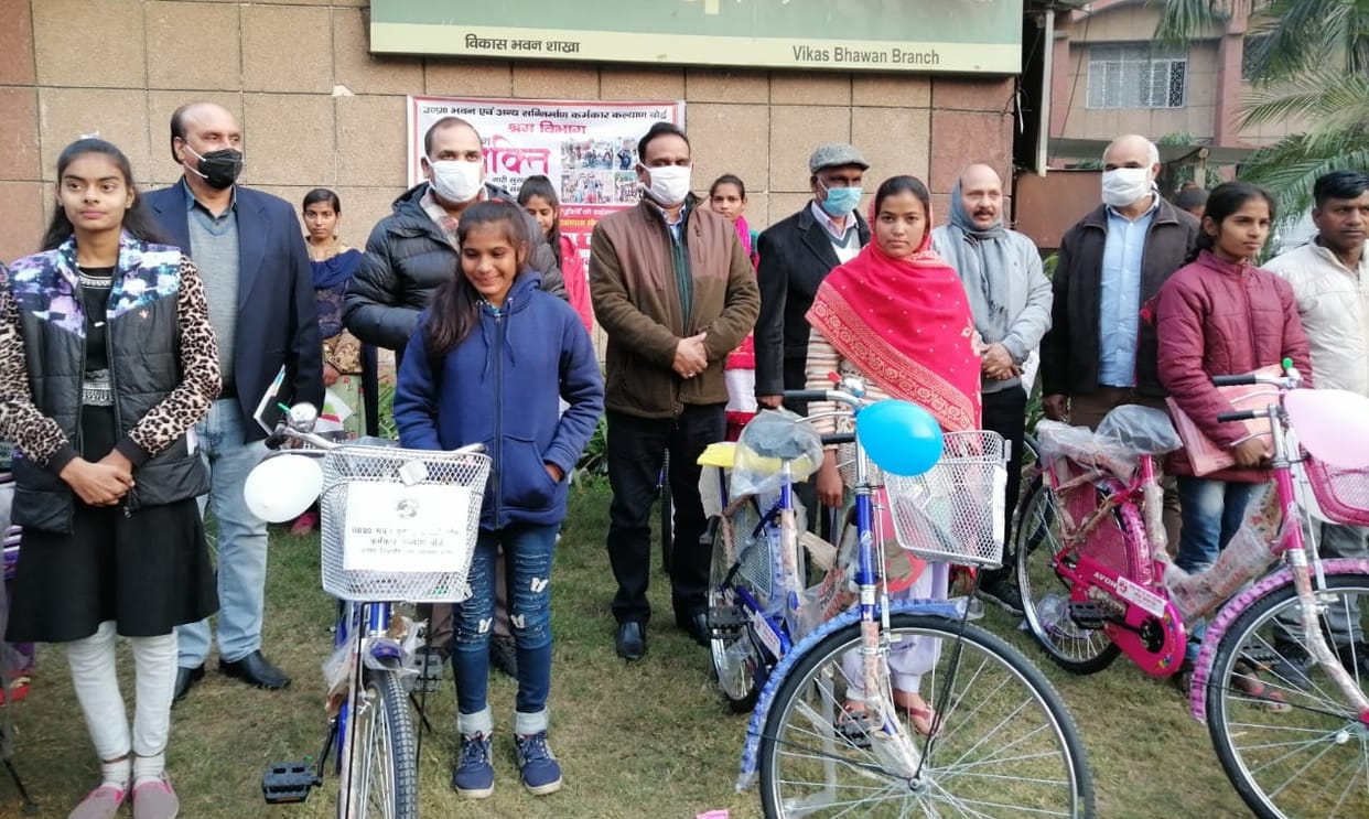 Bicycles distributed to workers' daughters
