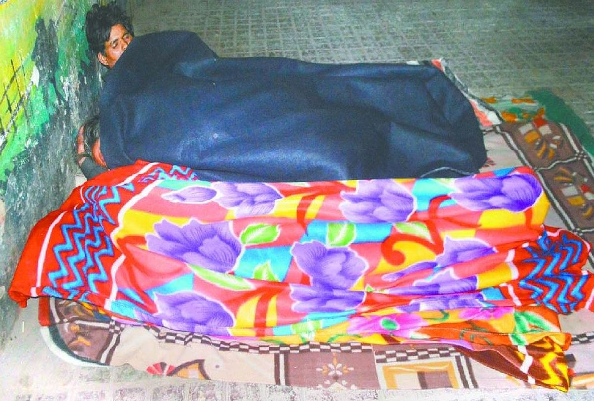 People Sleep At Footpath In Cold Winter Nights