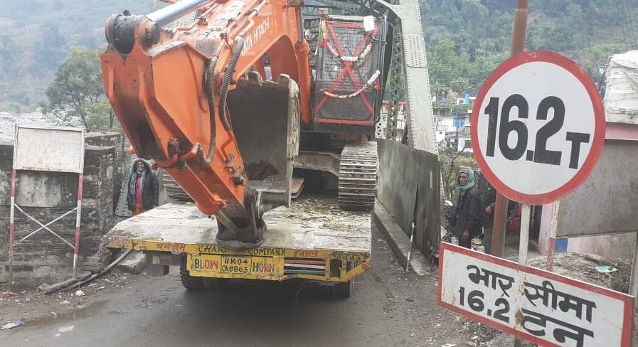 Threats to the bridge due to passing a vehicle twice the capacity