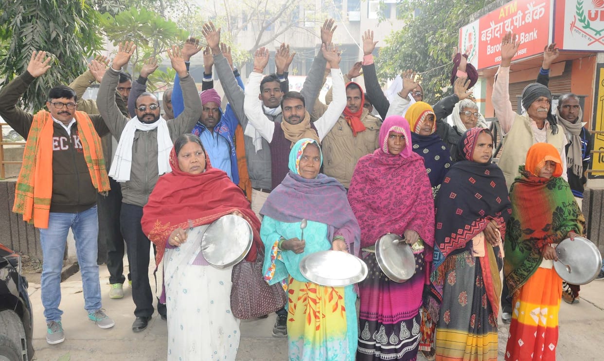 Villagers protested against officials involved in corruption by playing a plate