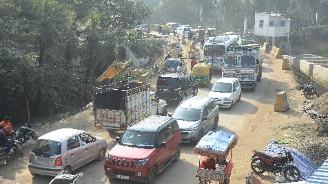 Truck overturned after being stuck in pits near red gate crossing