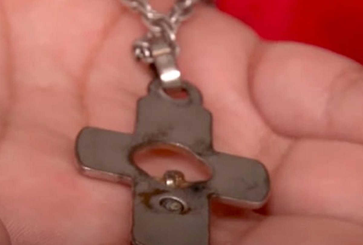 crucifix necklace saved life of the child in Argentina