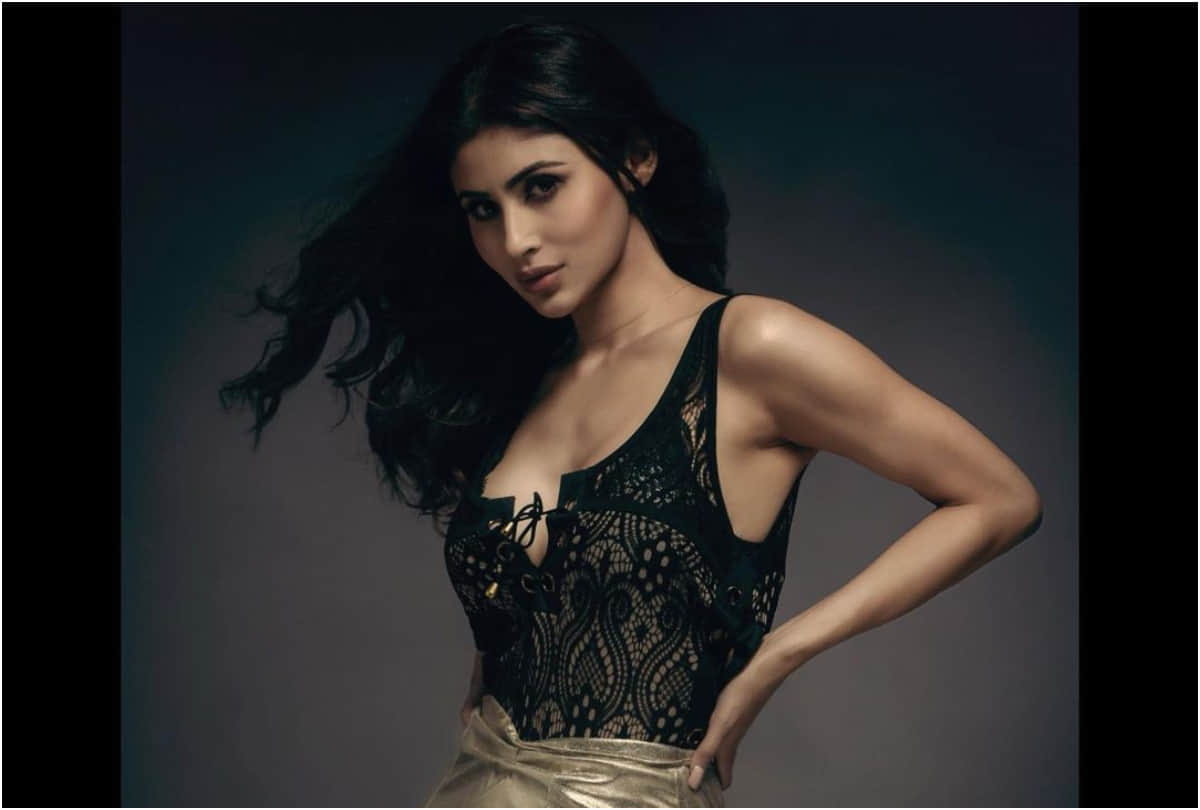 mouni roy post photos in golden mini skirt with black lace top