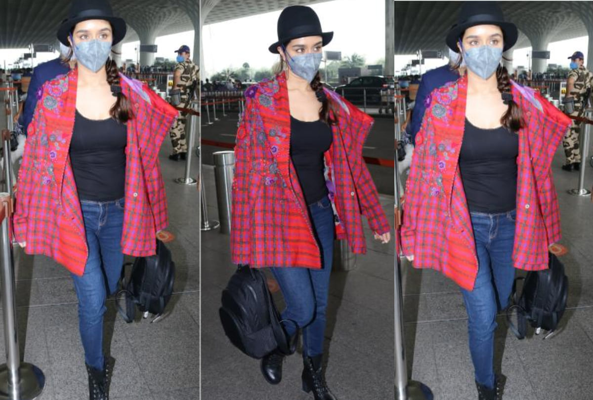 shraddha kapoor make a chic entry at airport in checkered print red jacket with classic blue jeans