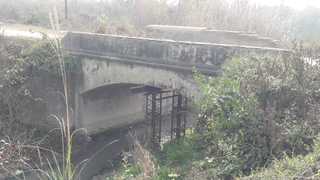 Old bridge in shabby condition, people upset
