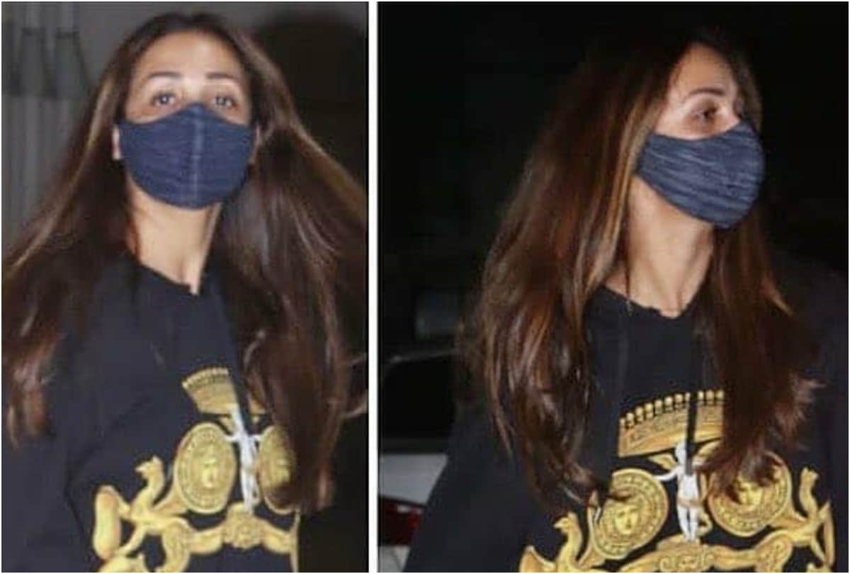 malaika arora look hot and comfy in black hoodie dress with matching boots