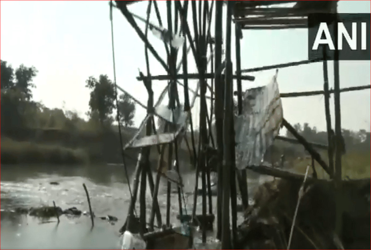 Farmer in Mayurbhanj sets up waterwheel instrument near river to irrigate his farmland situated 2 km away