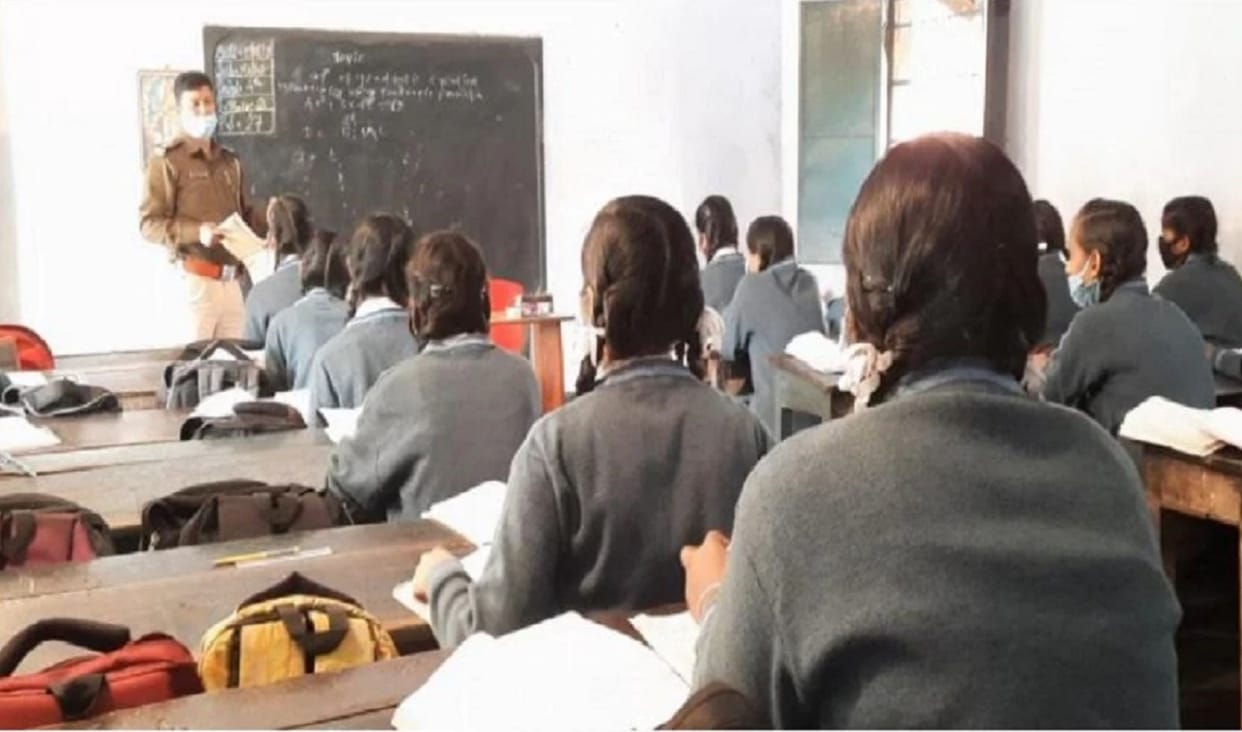 police station in-charge Pankaj Verma teaches mathematics to female students in Dhanbad