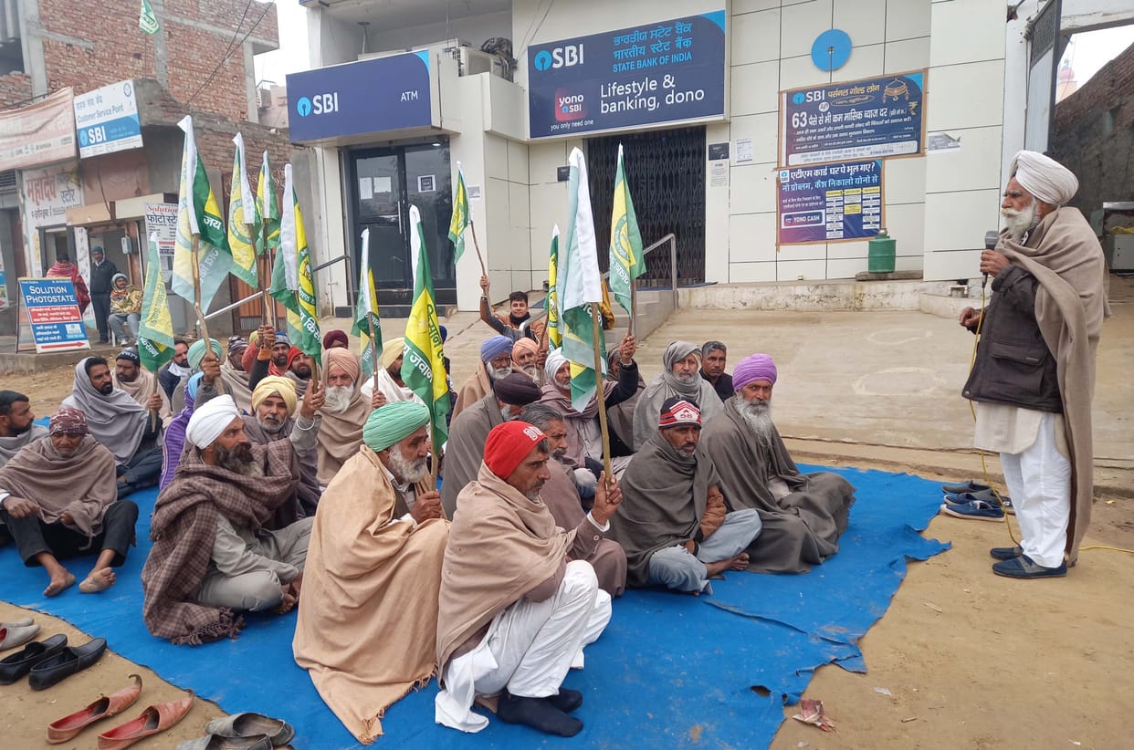farmer protest in front of bank