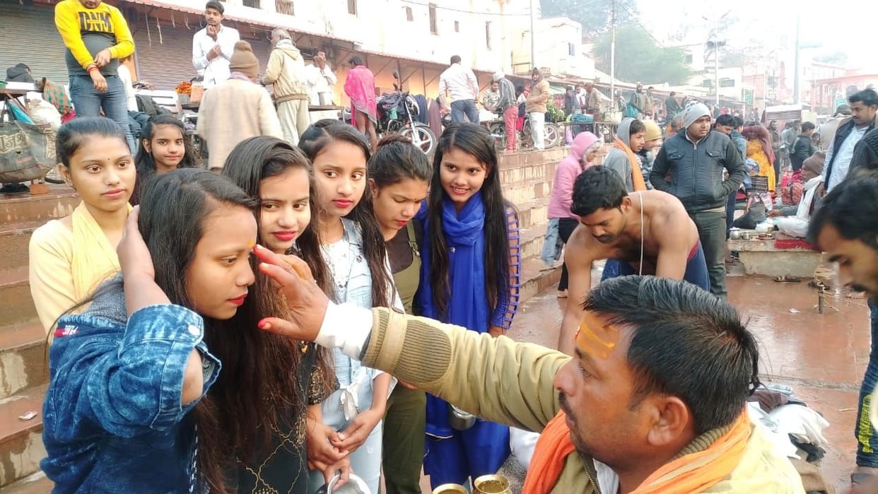 Devotees take a dip in Mandakini on Makar Sankranti