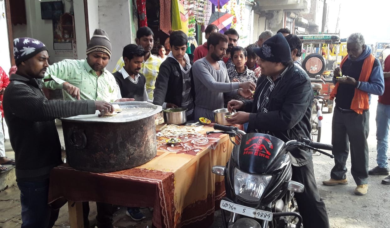 Dip in Ganges, made khichdi banquet