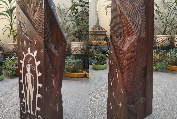 A Fine art teacher of chandigarh has depicted the change of city on wood  
