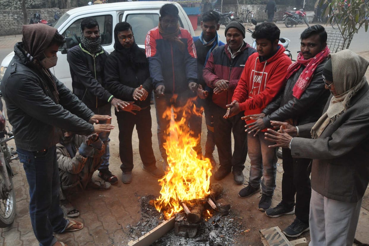 First time cold, people shiver in sweater-jacket too