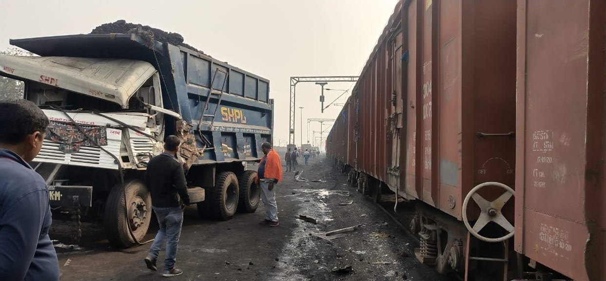 Freight train crashed into dumper and truck