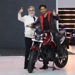 Dr. Pawan Munjal Chairman and CEO of Hero MotoCorp with Actor Shah Rukh Khan at unveiling of company’s 100 millionth motorcycle (File Photo)