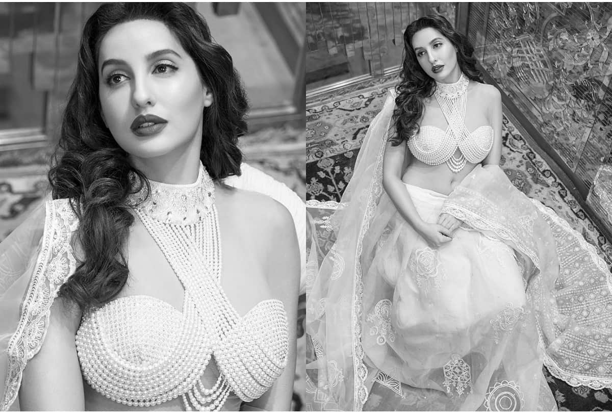 nora fatehi unmissable pic in mirror work blouse from abu jani sandeep khosla collection