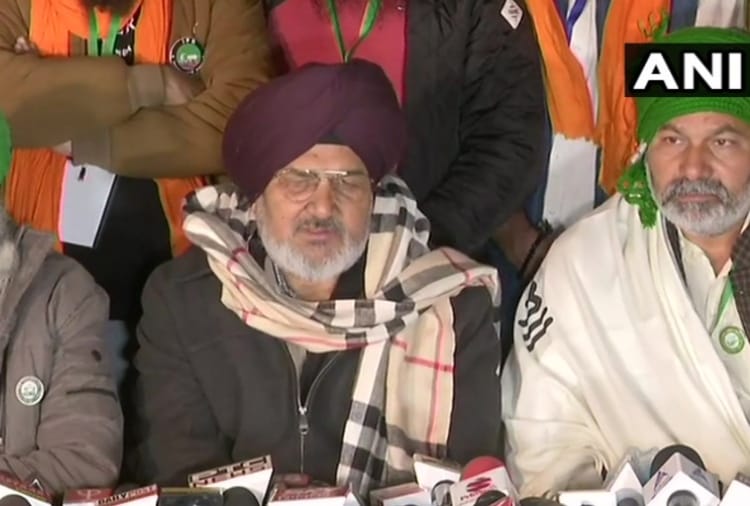 Farmers present a person who alleges a plot to shoot four farmer leaders and cause disruption