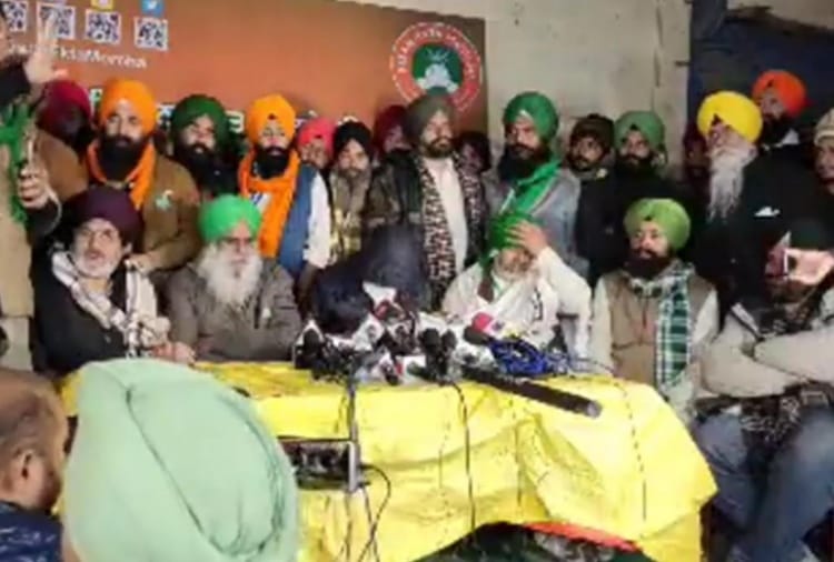 Farmers present a person who alleges a plot to shoot four farmer leaders and cause disruption