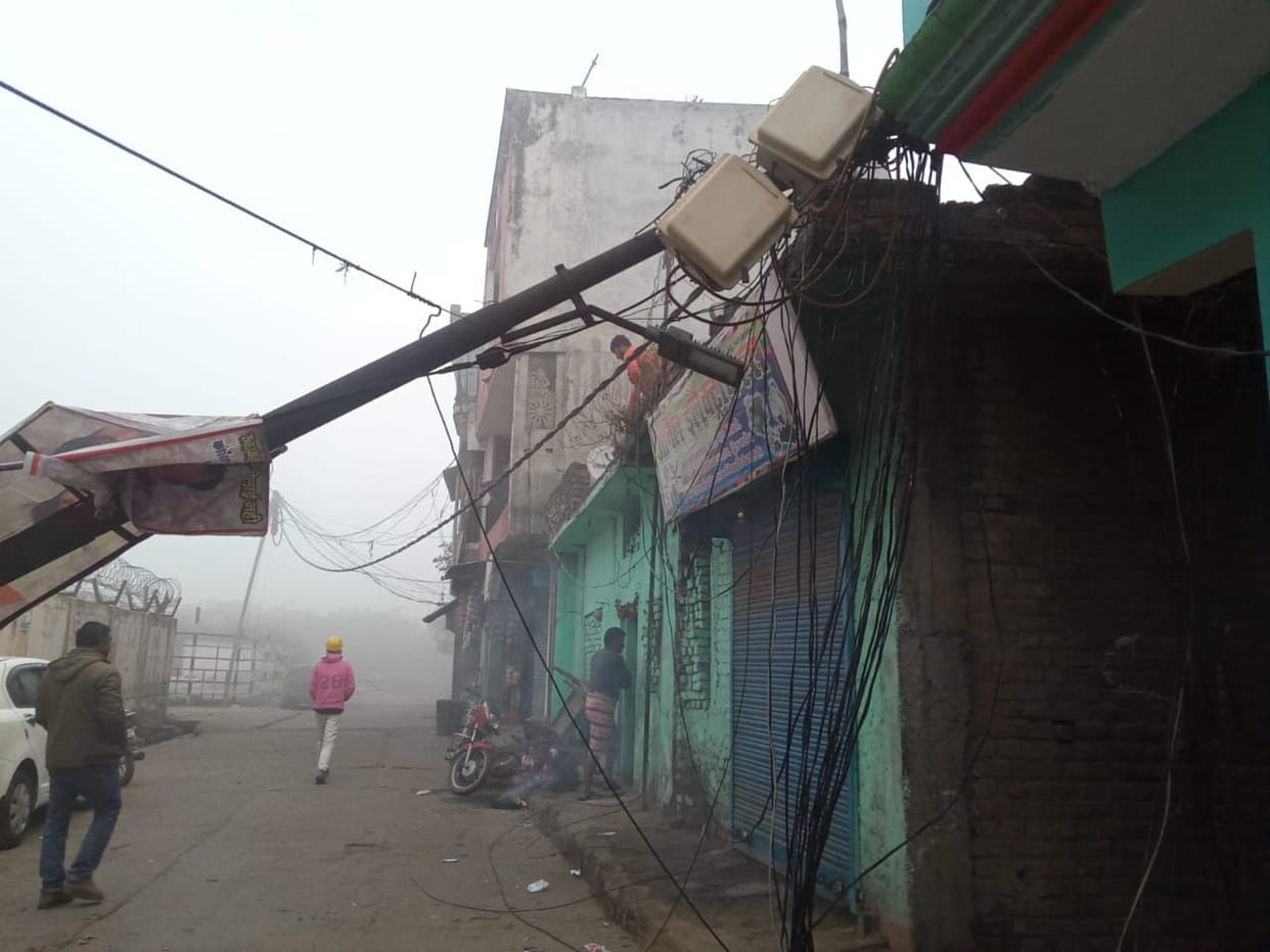 Electric pole fell on roof of house in Lalkua