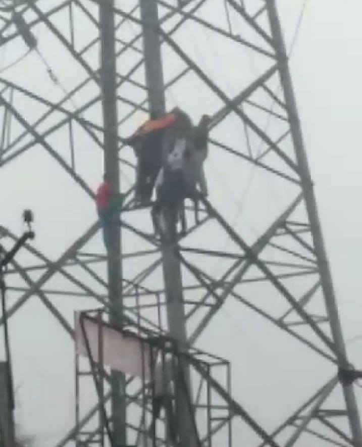 farmer, electric tower, electric tower