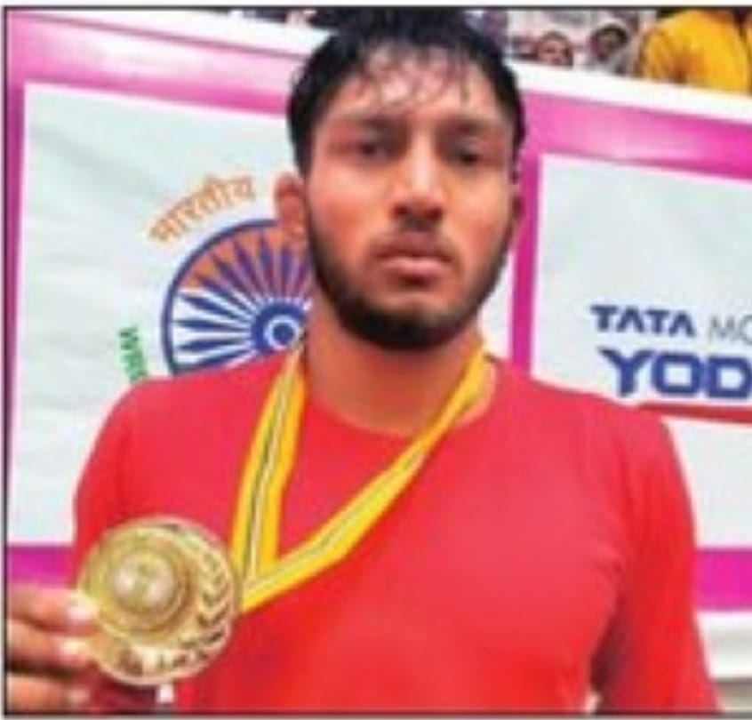 Father grazing sheep and son made wrestling champion