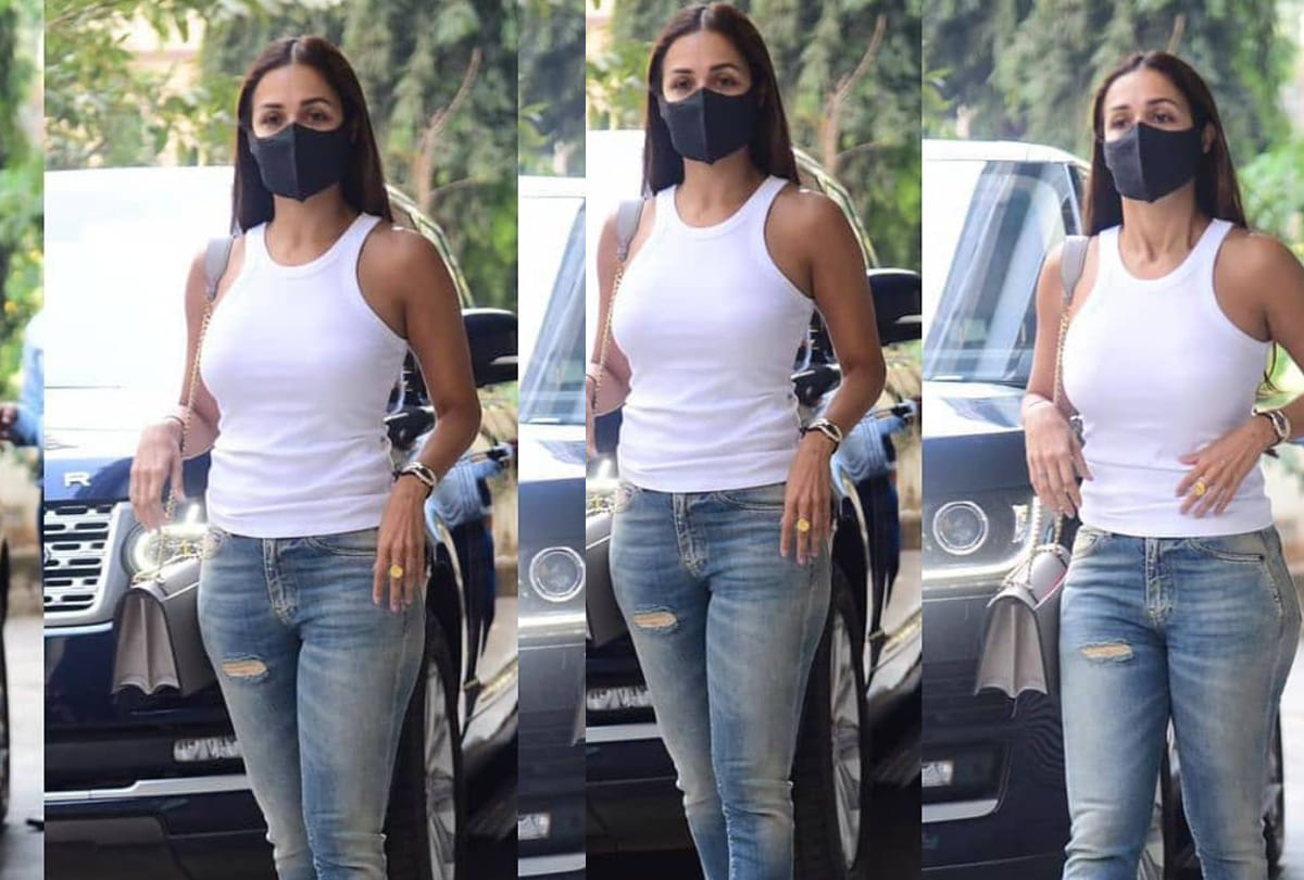 after trolled for flaunting stretch marks malaika arora spotted in white tank top with denim looking fabulous