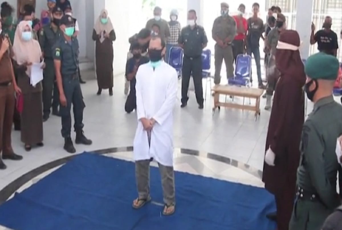 Gay couple gets punished caned publicly