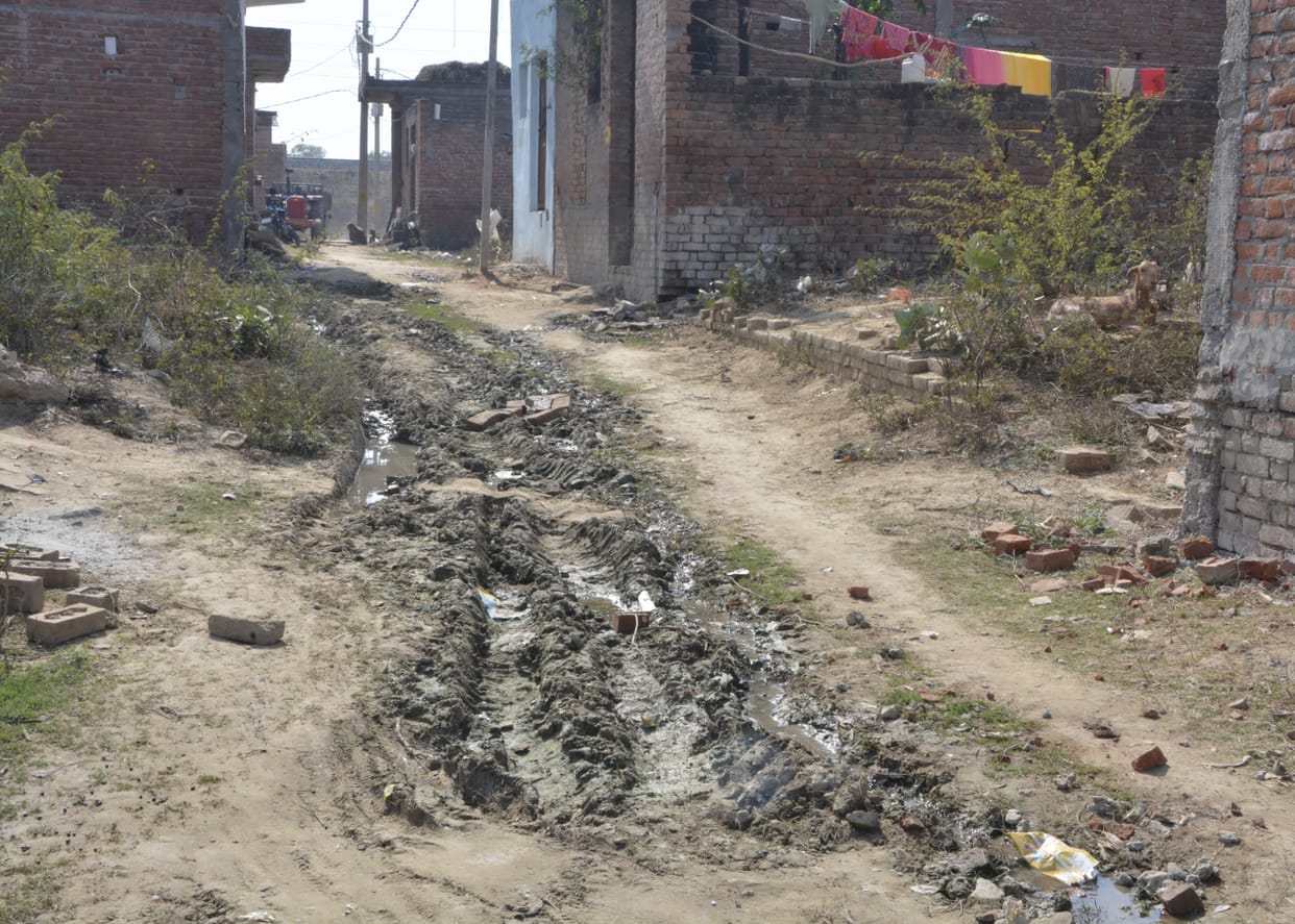 Raw streets, no water drainage, no drinking water line