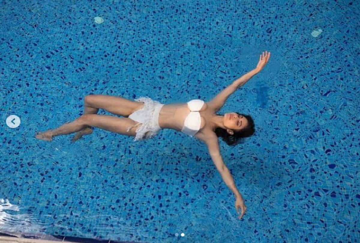 Actress Mouni Roy shares gorgeous pictures in white dress while swimming 