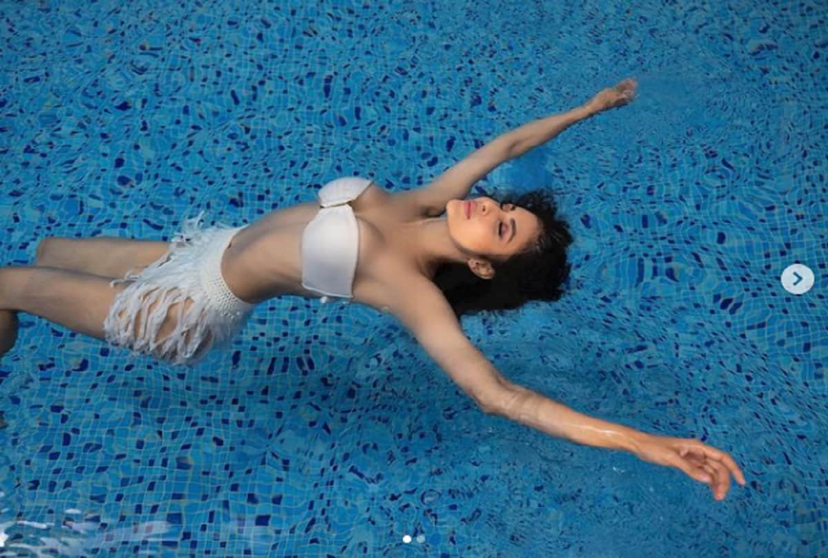 mouni roy shares throwback pic of her vacation looking gorgeous in white dreamy outfi