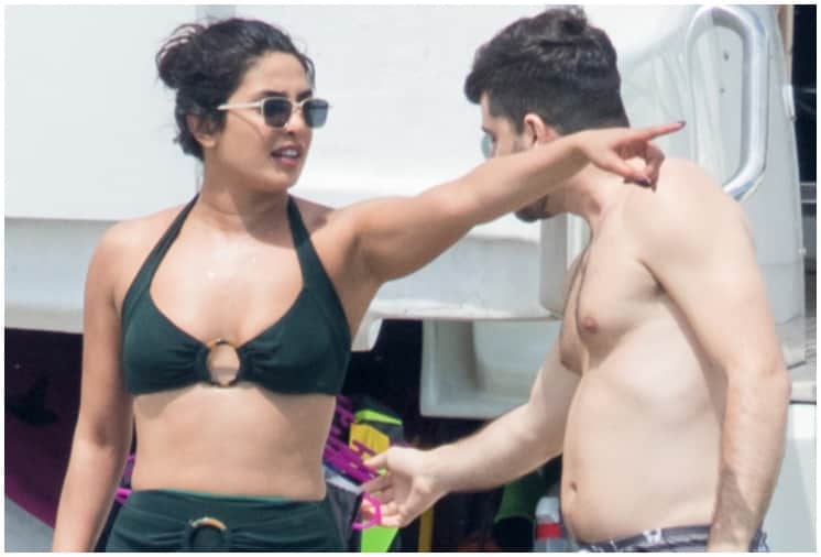 Priyanka Chopra Latest Red Swimsuit Photos Enjoying with Husband Nick Jonas In London