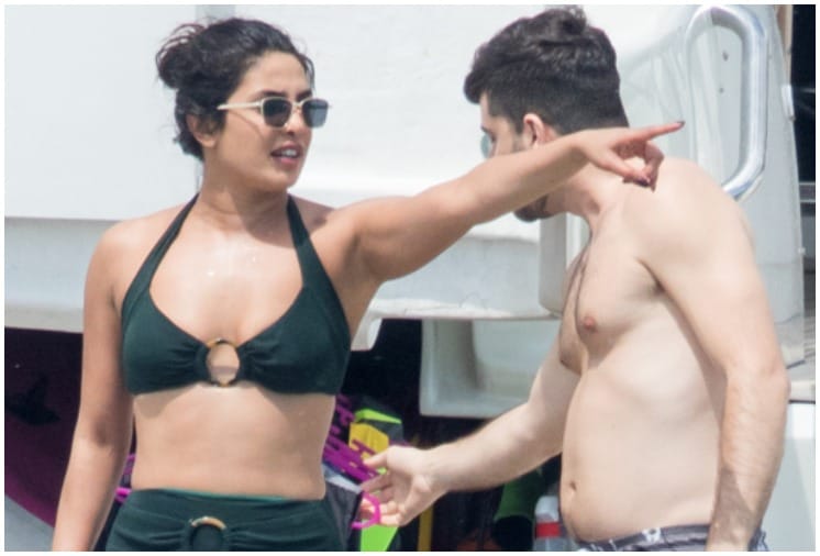 Priyanka Chopra Latest Red Swimsuit Photos Enjoying with Husband Nick Jonas In London