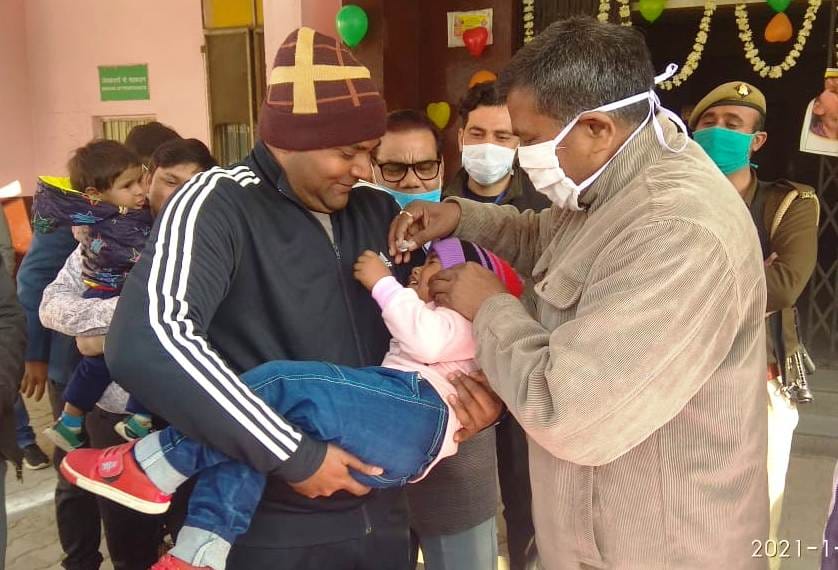 161409 children take the polio drop